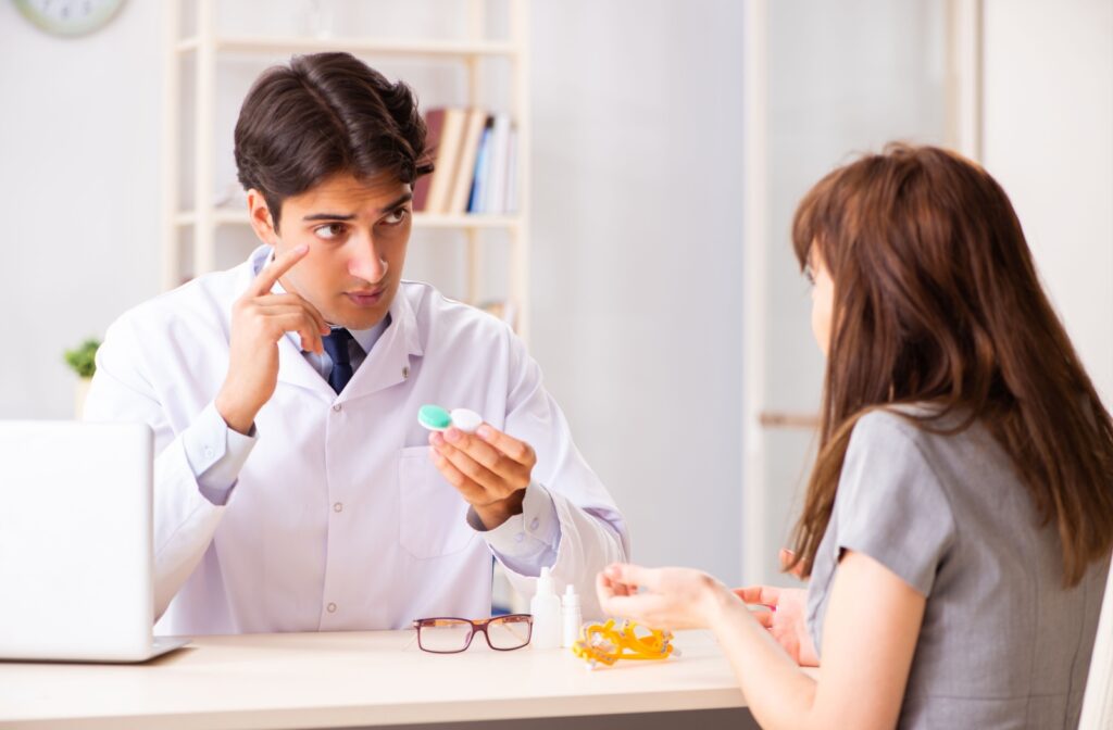 A person discusses contact lens with an optometrist